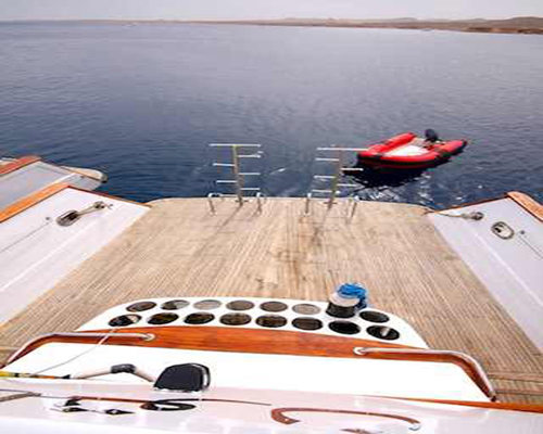 M/Y Carlton has a wide and long dive platform especially for divers with plenty for room for a whole group to be geared up and ready to jump.